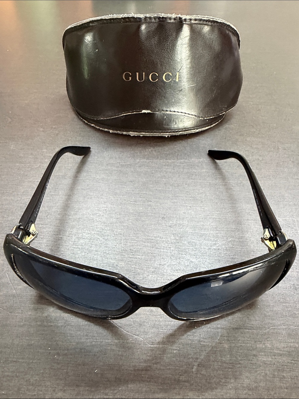 Gucci Black Women's Wrap Sunglasses with Gold Accents